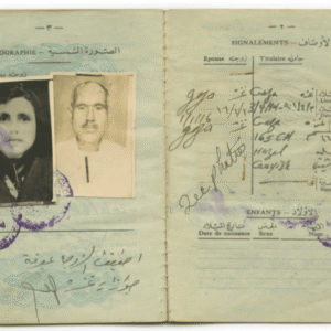 Open passport showing two identification photos