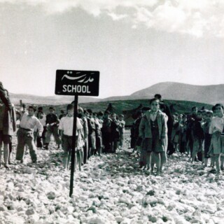 A boys' school in the sand, in Jalazone refugee camp in the West Bank © 1950. UNRWA Archive. Photographer Unknown