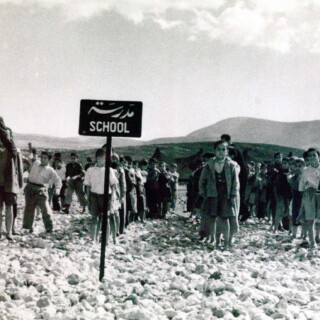 A boys' school in the sand, in Jalazone refugee camp in the West Bank © 1950. UNRWA Archive. Photographer Unknown