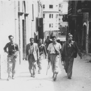 Zionist forces walk the streets during the Battle of Haifa, April 1948